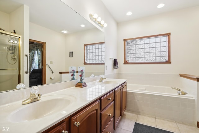 bathroom with vanity, tile patterned floors, and independent shower and bath