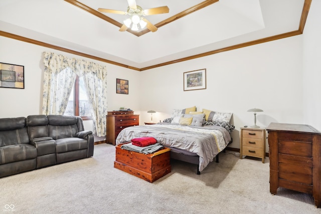 bedroom with ceiling fan, a raised ceiling, light colored carpet, and ornamental molding