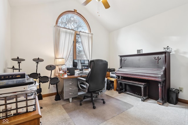 office space with light carpet, ceiling fan, and lofted ceiling