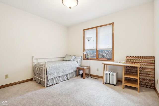 carpeted bedroom featuring radiator heating unit