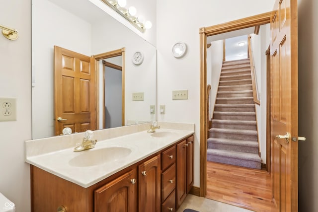 bathroom featuring tile patterned flooring and vanity