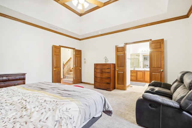 bedroom with ensuite bath, ceiling fan, light carpet, and ornamental molding