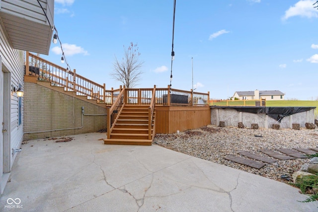 view of patio / terrace featuring a wooden deck