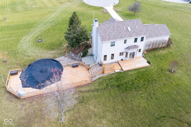 birds eye view of property featuring a rural view