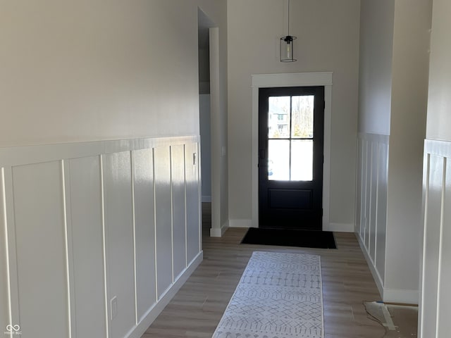 entryway with light hardwood / wood-style flooring