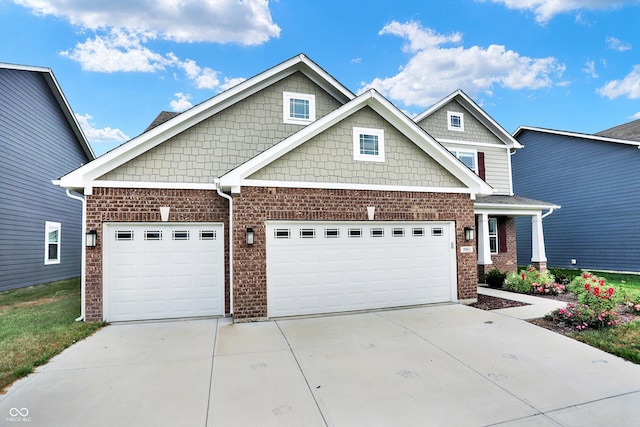 craftsman-style home featuring a garage