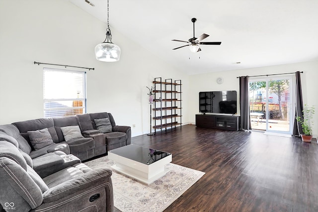 living room featuring ceiling fan, dark hardwood / wood-style flooring, and high vaulted ceiling