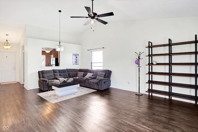 living room featuring ceiling fan, dark wood-type flooring, and high vaulted ceiling