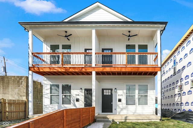 back of house with ceiling fan