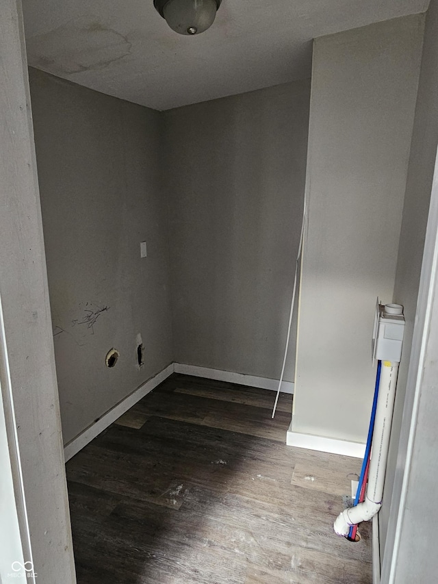 empty room with dark hardwood / wood-style floors