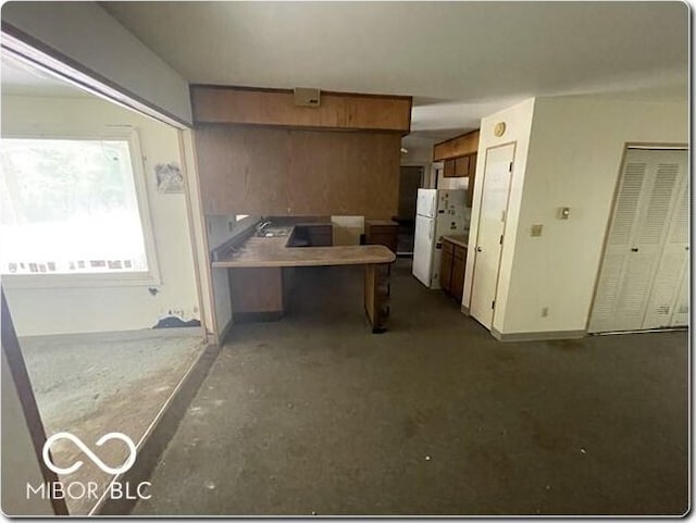 kitchen with white fridge and sink