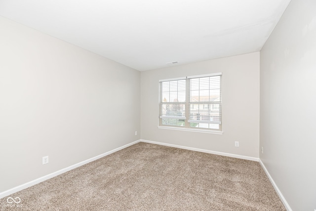 view of carpeted spare room