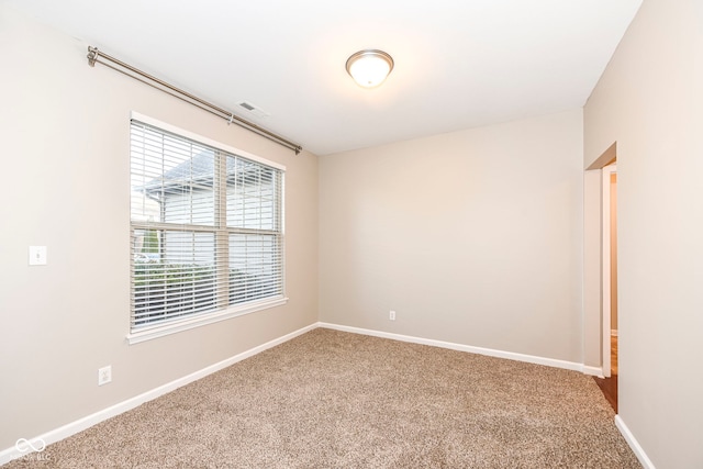 view of carpeted spare room