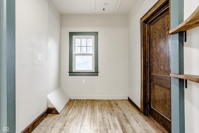 spare room with light hardwood / wood-style floors