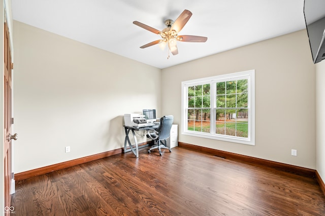 office with ceiling fan and dark wood-type flooring