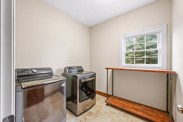 laundry room featuring washer and clothes dryer