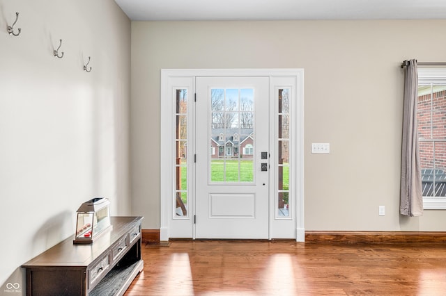 entrance foyer featuring hardwood / wood-style flooring