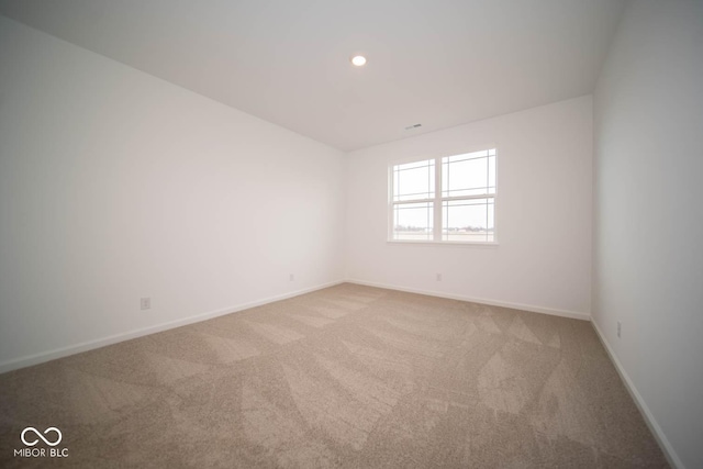 5607 Tart Blvd, Indianapolis, IN 46239 - carpeted spare room with baseboards and recessed lighting