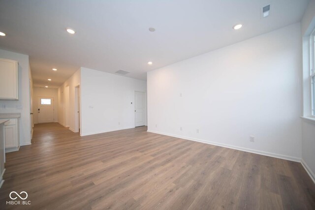 5607 Tart Blvd, Indianapolis, IN 46239 - empty room with wood finished floors and recessed lighting