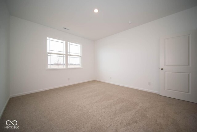 5607 Tart Blvd, Indianapolis, IN 46239 - unfurnished room with carpet floors and recessed lighting