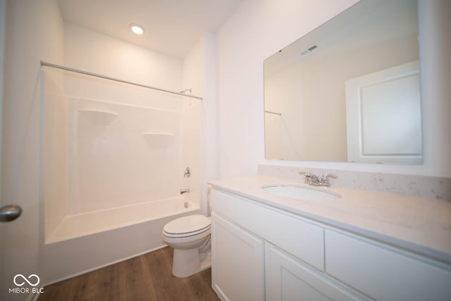 5607 Tart Blvd, Indianapolis, IN 46239 - full bath featuring vanity, tub / shower combination, and wood finished floors