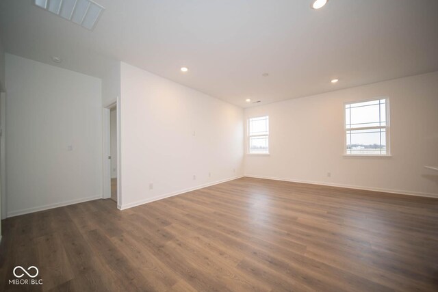 5607 Tart Blvd, Indianapolis, IN 46239 - spare room featuring wood finished floors and recessed lighting