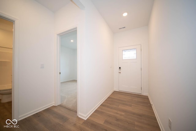 5607 Tart Blvd, Indianapolis, IN 46239 - hall featuring dark wood-style flooring and recessed lighting