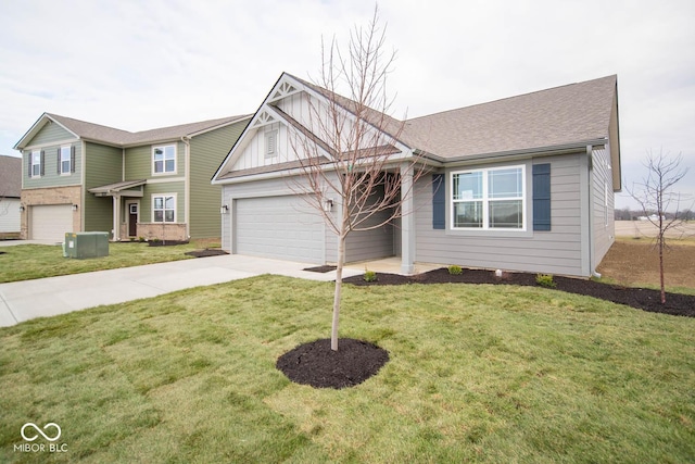 view of front of house with a garage, a front lawn, and central air condition unit