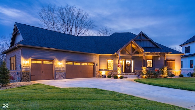 craftsman house with a shingled roof, concrete driveway, board and batten siding, a garage, and a front lawn