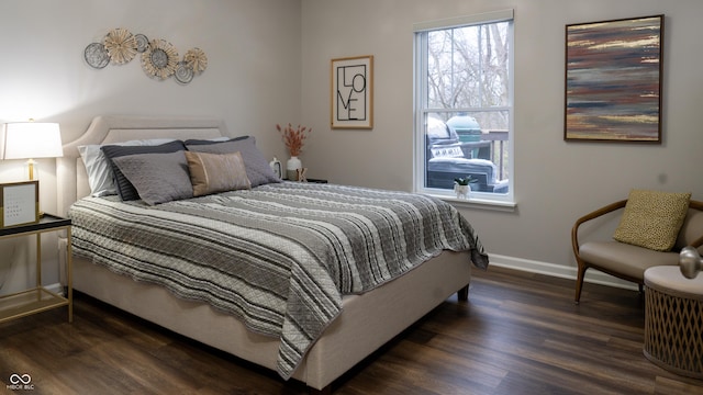 bedroom featuring dark hardwood / wood-style floors