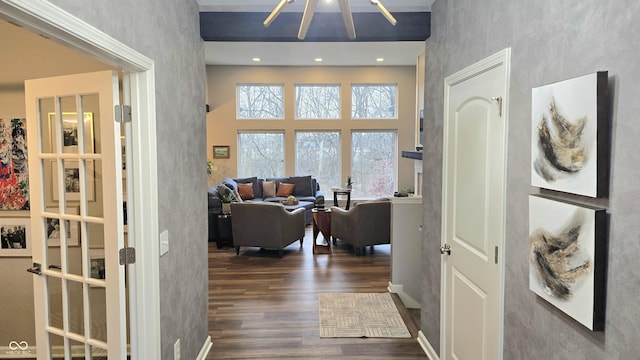 corridor featuring dark hardwood / wood-style flooring