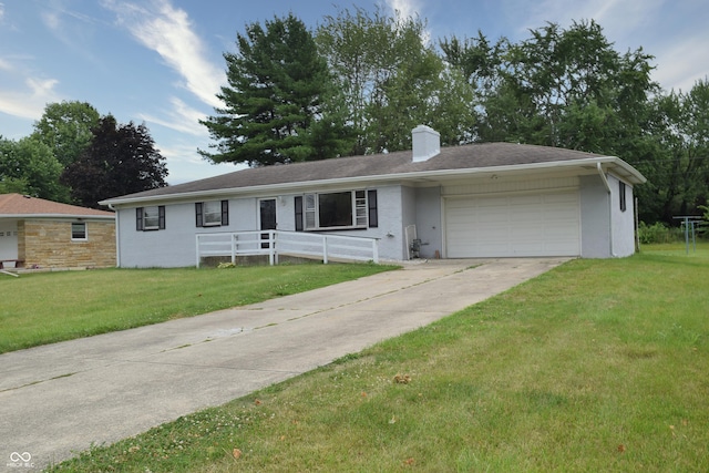 ranch-style house with a front lawn and a garage