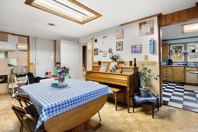 dining room featuring light parquet floors