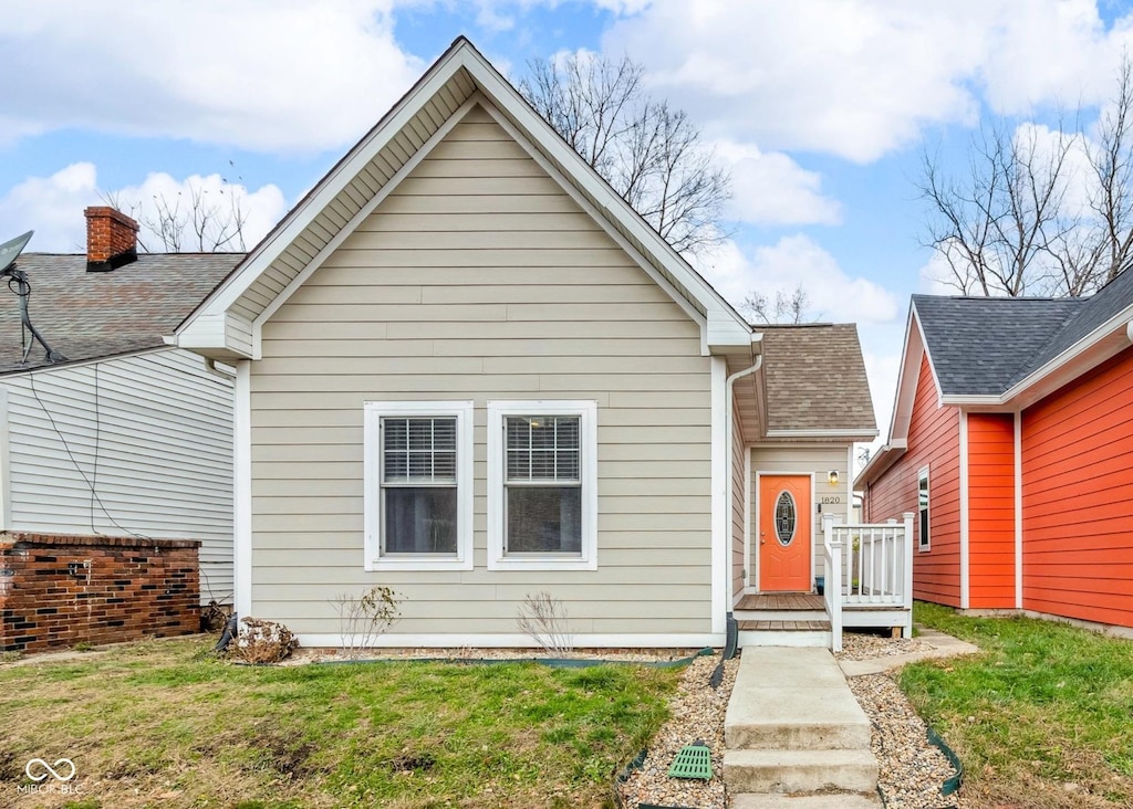 exterior space featuring a front lawn