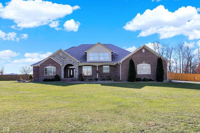 view of front of home featuring a front lawn