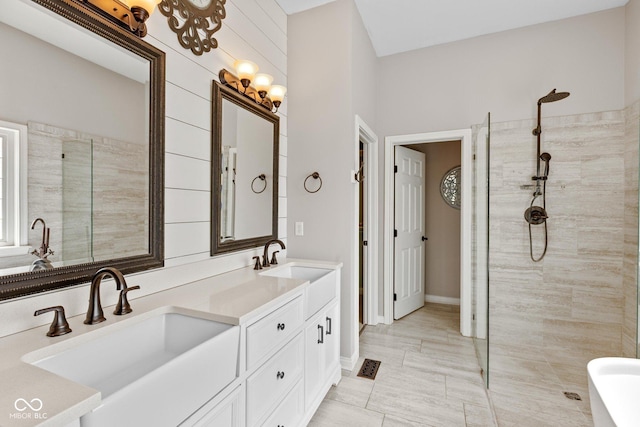 10346 Strongbow Rd, Fishers, IN 46040 - bathroom featuring walk in shower, double vanity, and a soaking tub