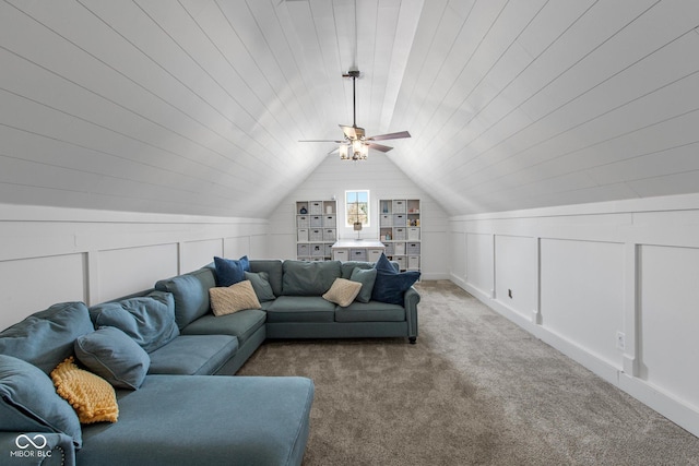10346 Strongbow Rd, Fishers, IN 46040 - living room with a decorative wall, carpet floors, vaulted ceiling, and a ceiling fan
