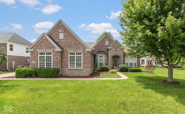 10346 Strongbow Rd, Fishers, IN 46040 - view of front facade with brick siding and a front yard