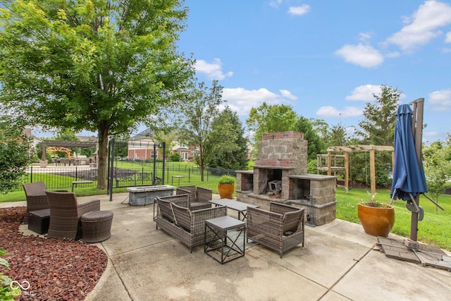 10346 Strongbow Rd, Fishers, IN 46040 - view of patio / terrace with an outdoor stone fireplace and a pergola