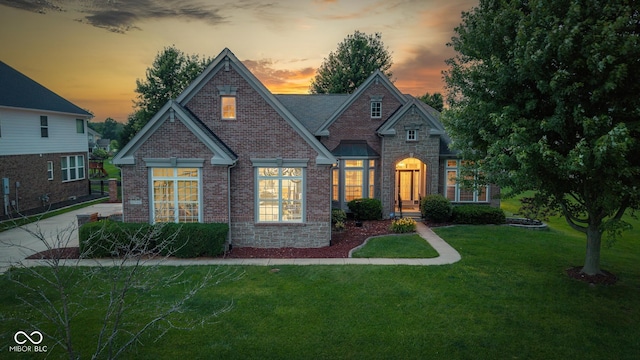 10346 Strongbow Rd, Fishers, IN 46040 - view of front of property with brick siding and a yard