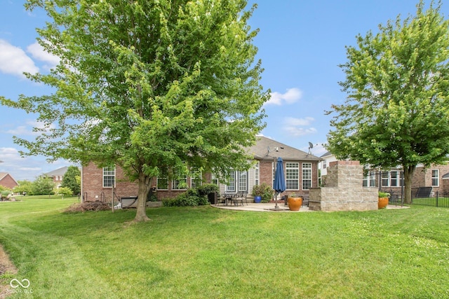 10346 Strongbow Rd, Fishers, IN 46040 - view of front of home with brick siding and a patio area