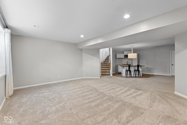 10346 Strongbow Rd, Fishers, IN 46040 - finished basement featuring carpet, stairs, and recessed lighting