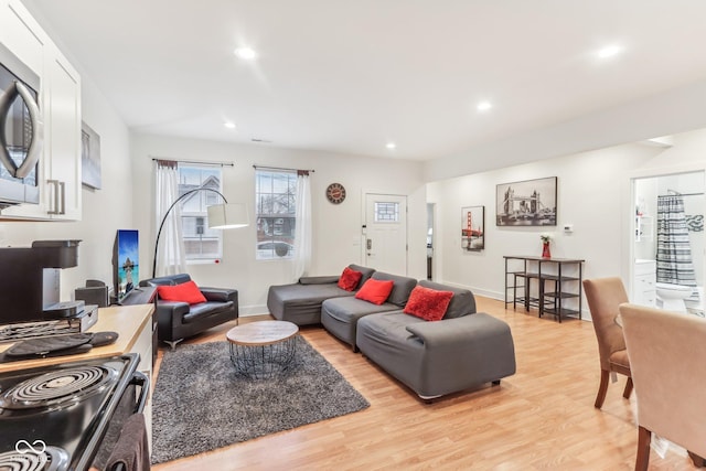 359 Terrace Ave, Indianapolis, IN 46225 - living room featuring light wood-type flooring, baseboards, and recessed lighting