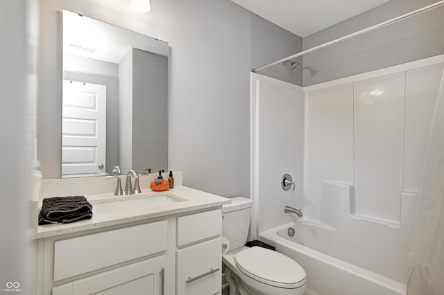 full bathroom with vanity, toilet, and bathtub / shower combination