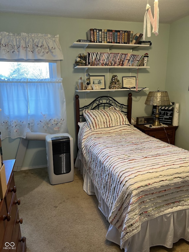 bedroom featuring carpet