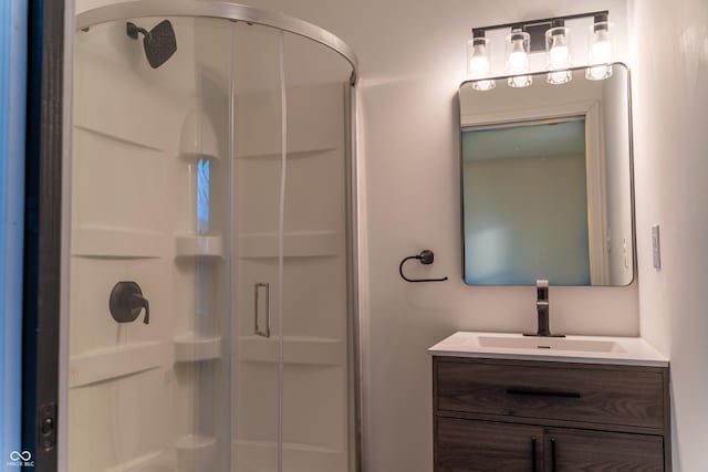 bathroom featuring vanity and walk in shower