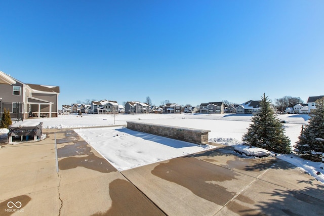 view of snow covered patio