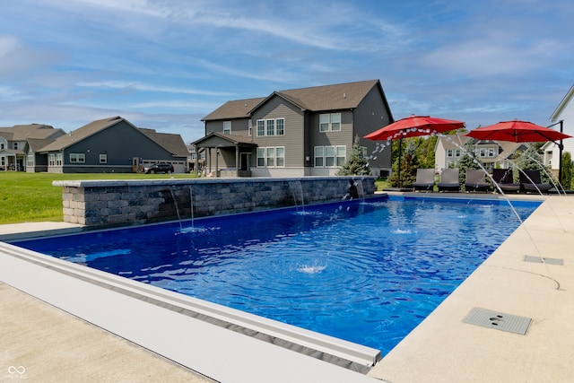 view of pool featuring pool water feature