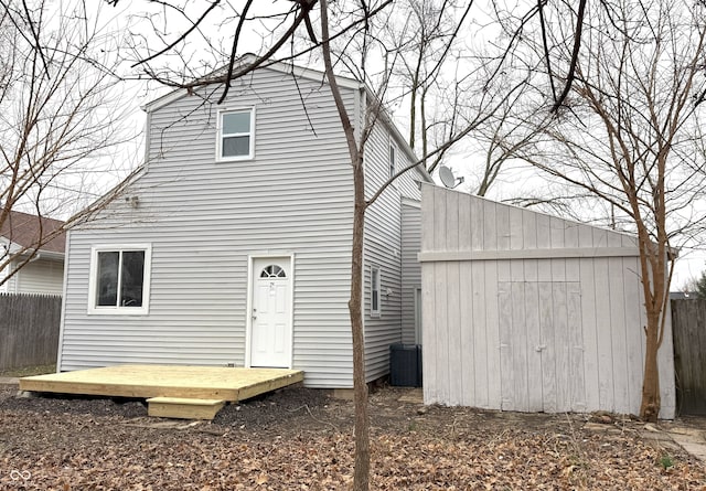 back of property featuring a deck