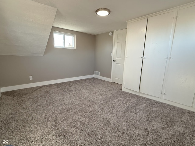 basement featuring carpet floors